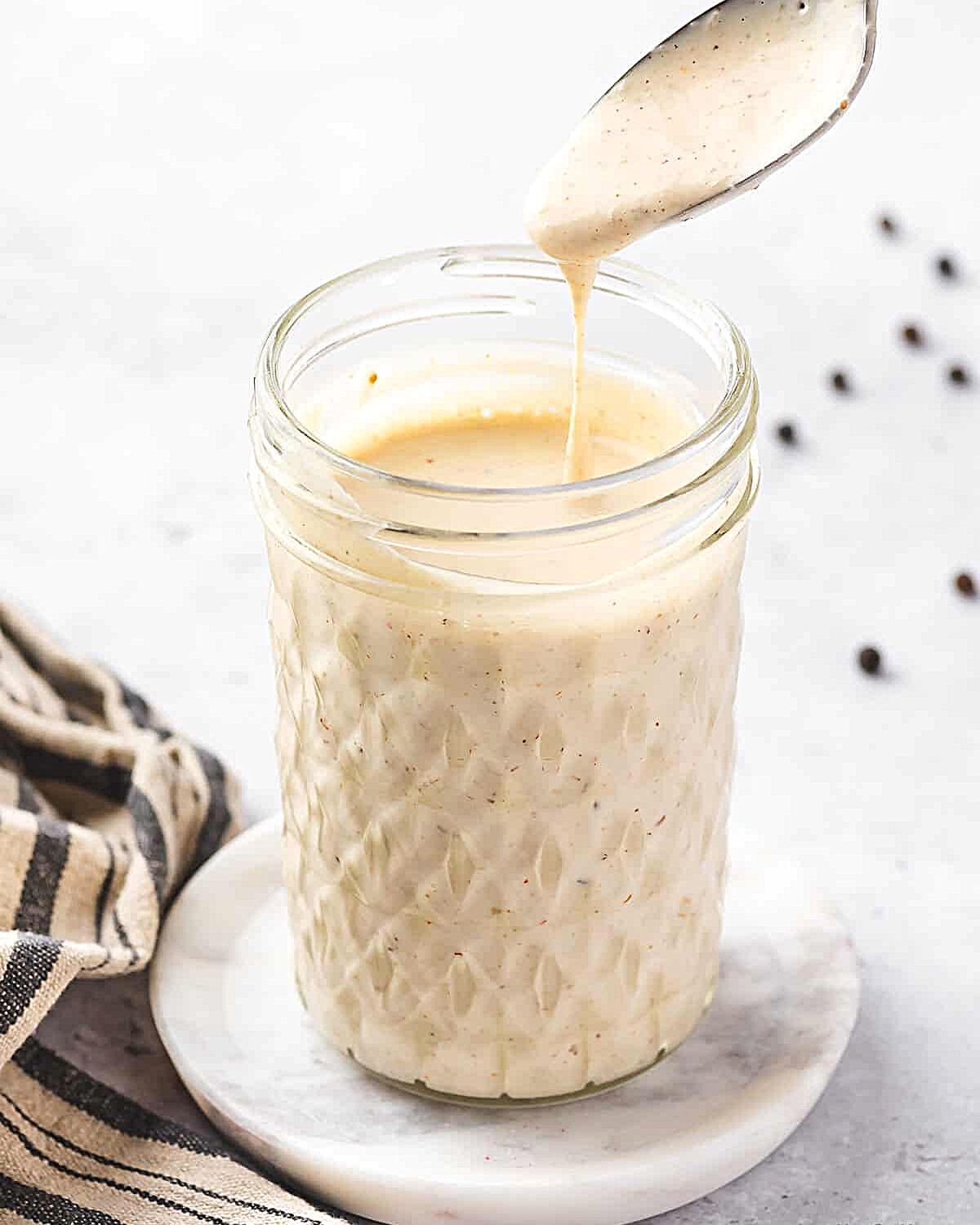 Jar with Alabama white sauce.