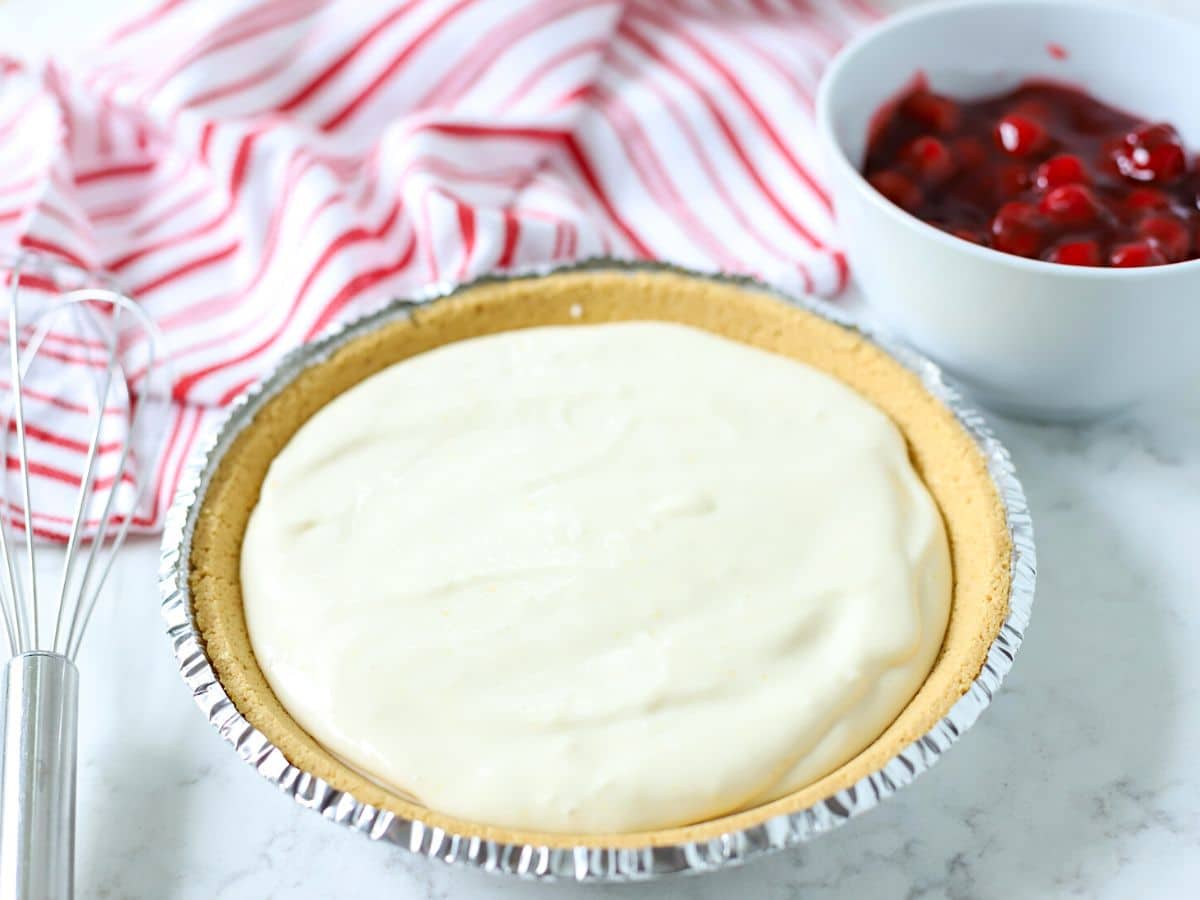 Cheesecake filling in a pie tin.