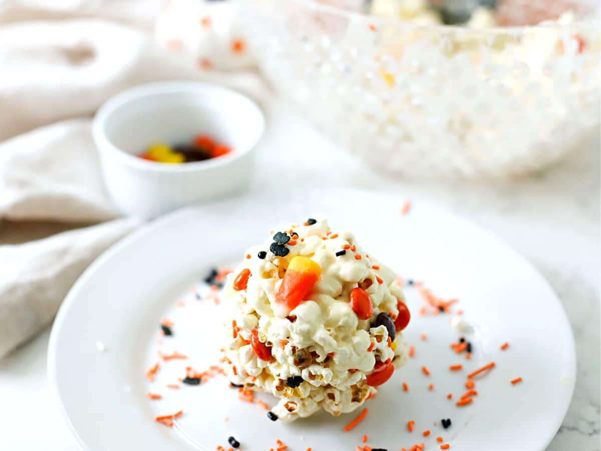 Popcorn ball on a plate.