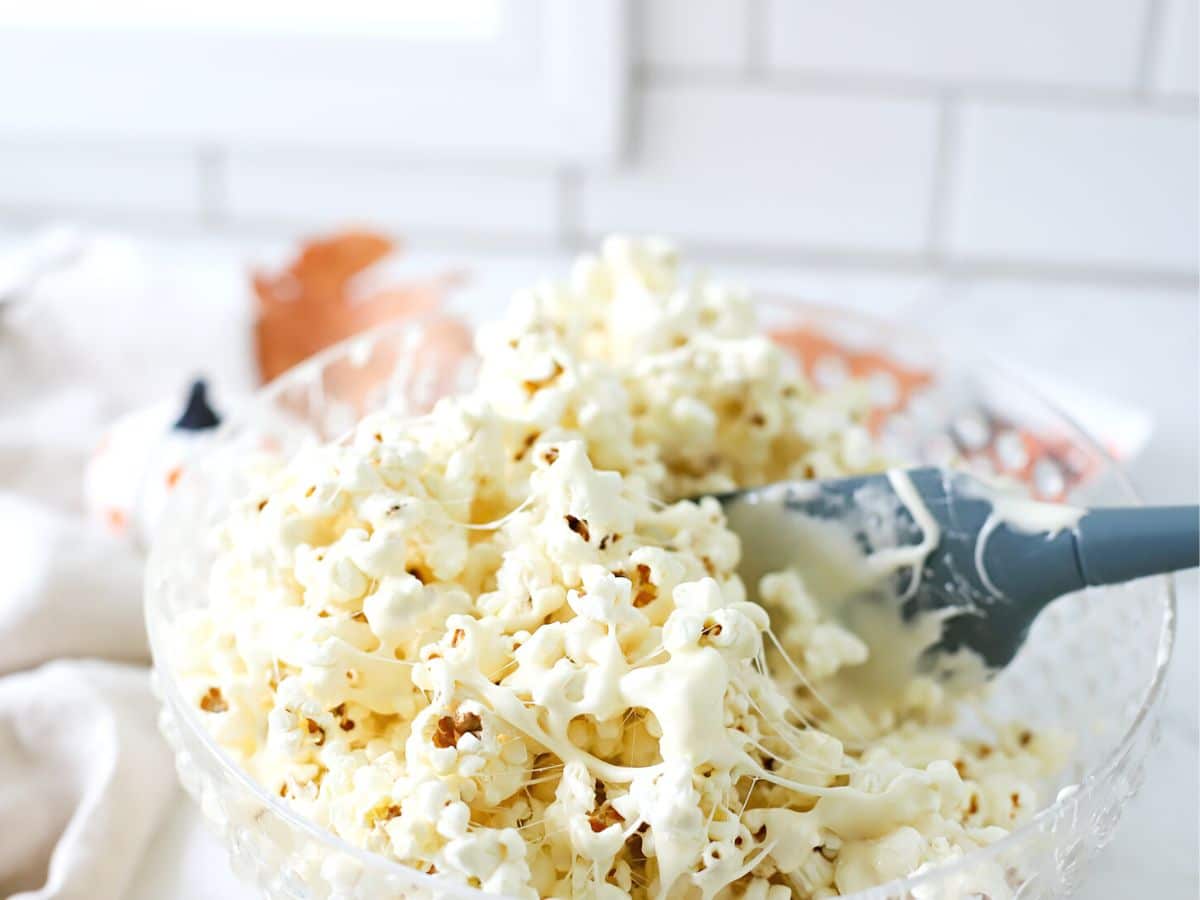 Popcorn in a bowl with melted marshmallows.