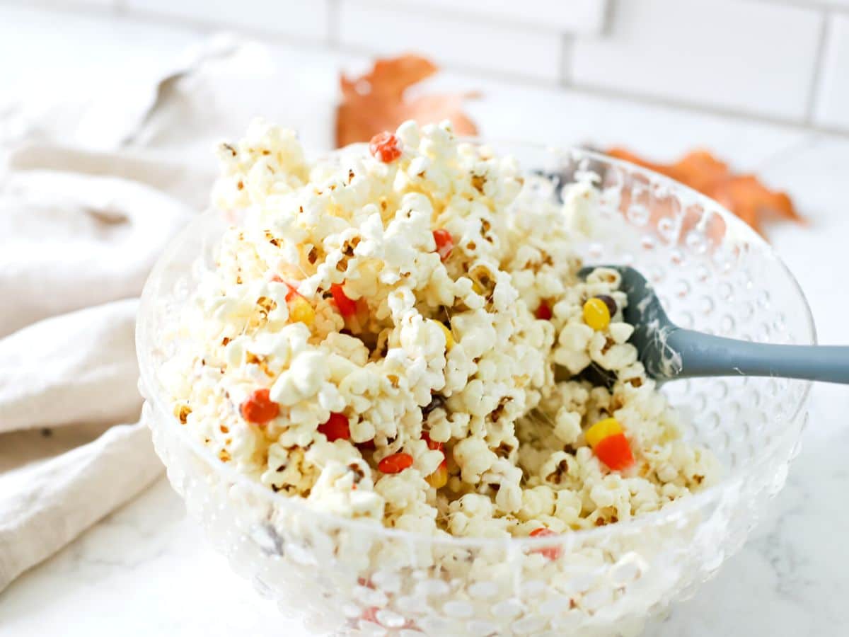 Popcorn with candies in a bowl.