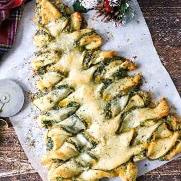 Breadstick Christmas appetizer on a cutting board.