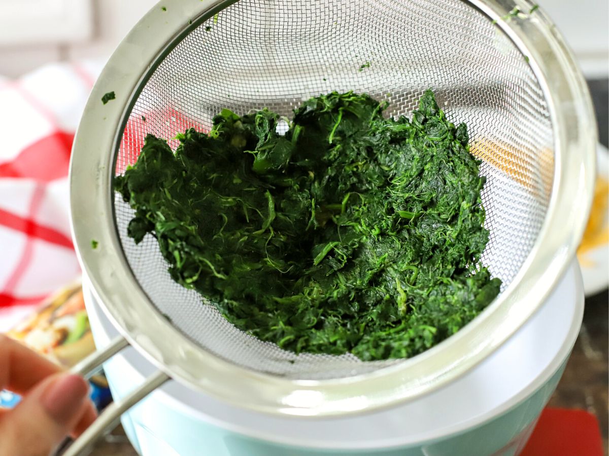 spinach in a strainer.