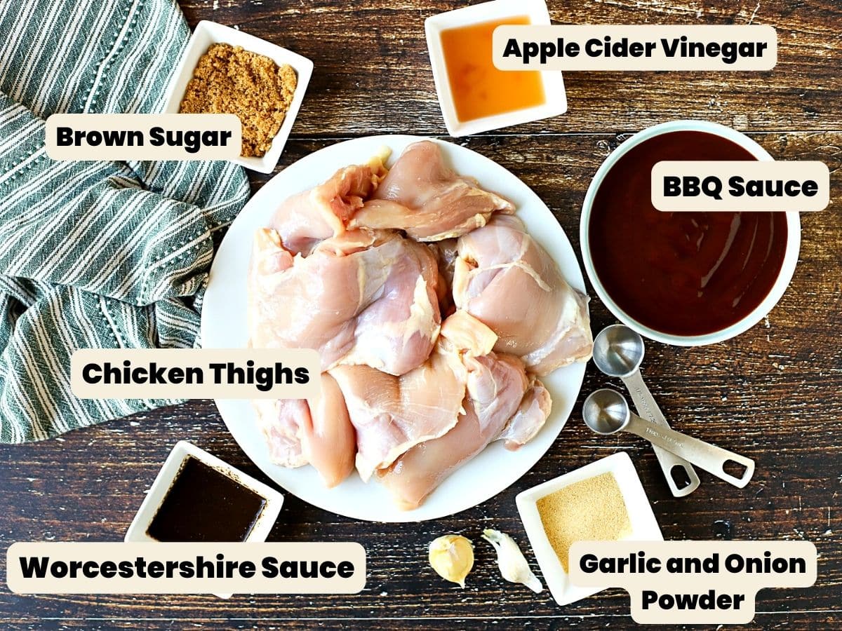 Ingredients to make slow cooker BBQ chicken including BBQ sauce, apple cider vinegar, and Worcestershire sauce.