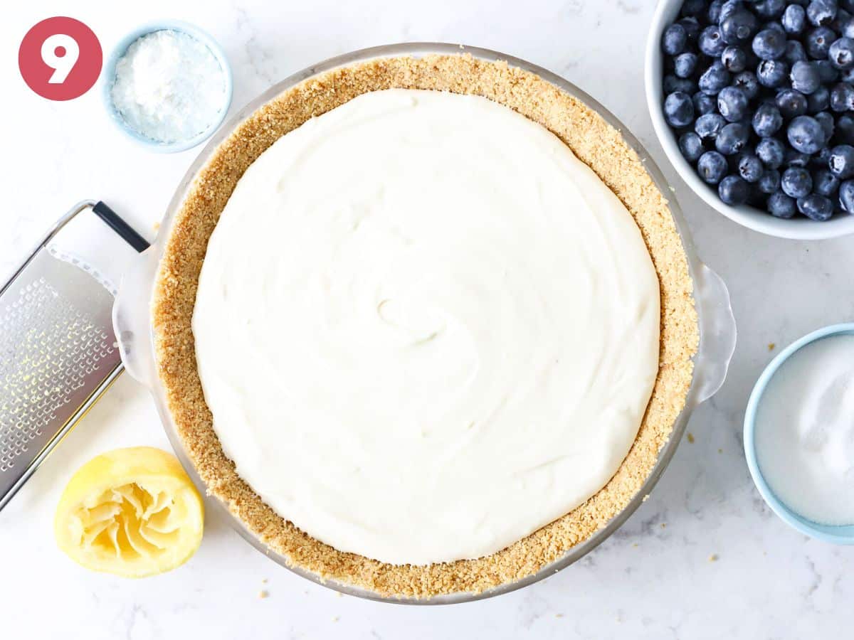 Cream cheese pie filling in a graham cracker crust.