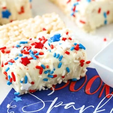 A rice krispie marshmallow treat on a napkin.