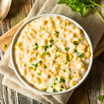 Slow cooker creamed corn in a bowl.