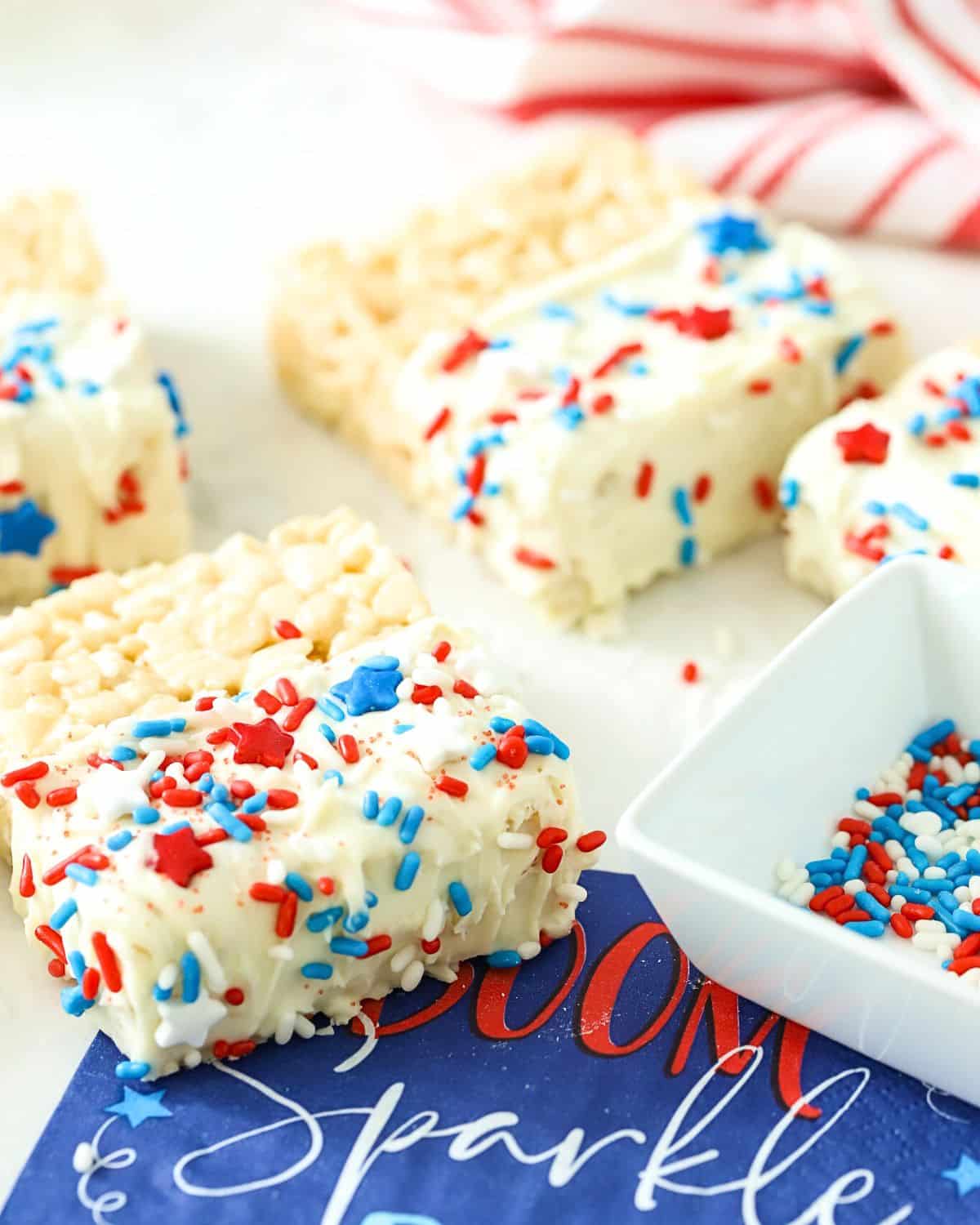 A Marshmallow treat with red, white, and blue sprinkles on it.