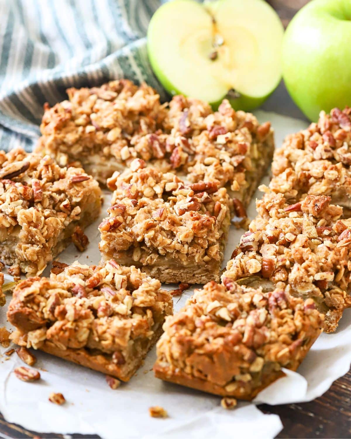 Squares of baked oatmeal bars with apple.