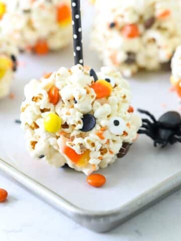 Popcorn ball for Halloween with candy inside.