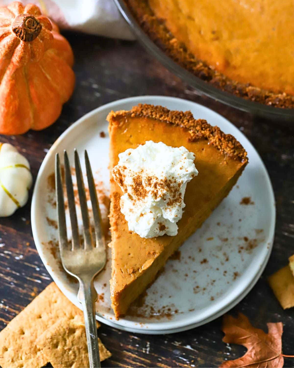 Top view of a freshly baked pumpkin pie with graham cracker crust.