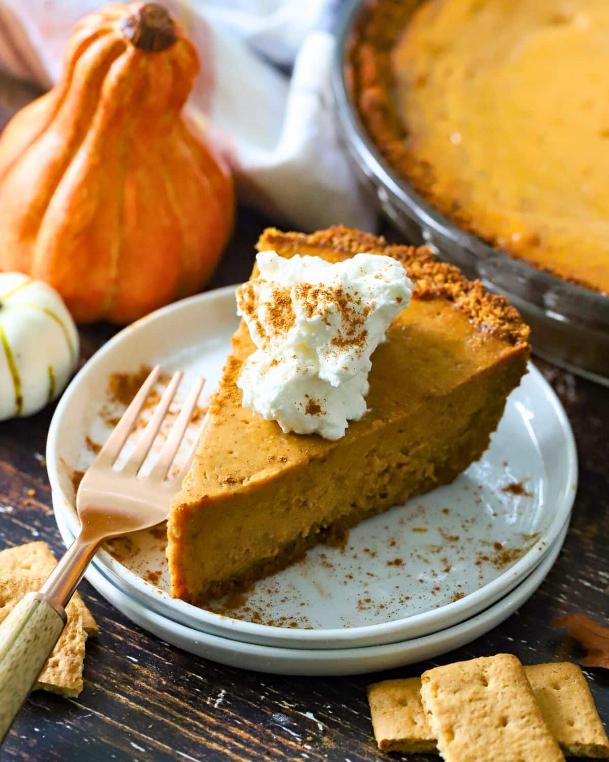 Pie of pie for Thanksgiving on a plate with a fork.