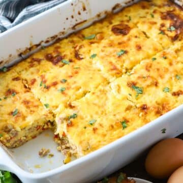 A baked breakfast casserole with eggs, cheese, and sausage.