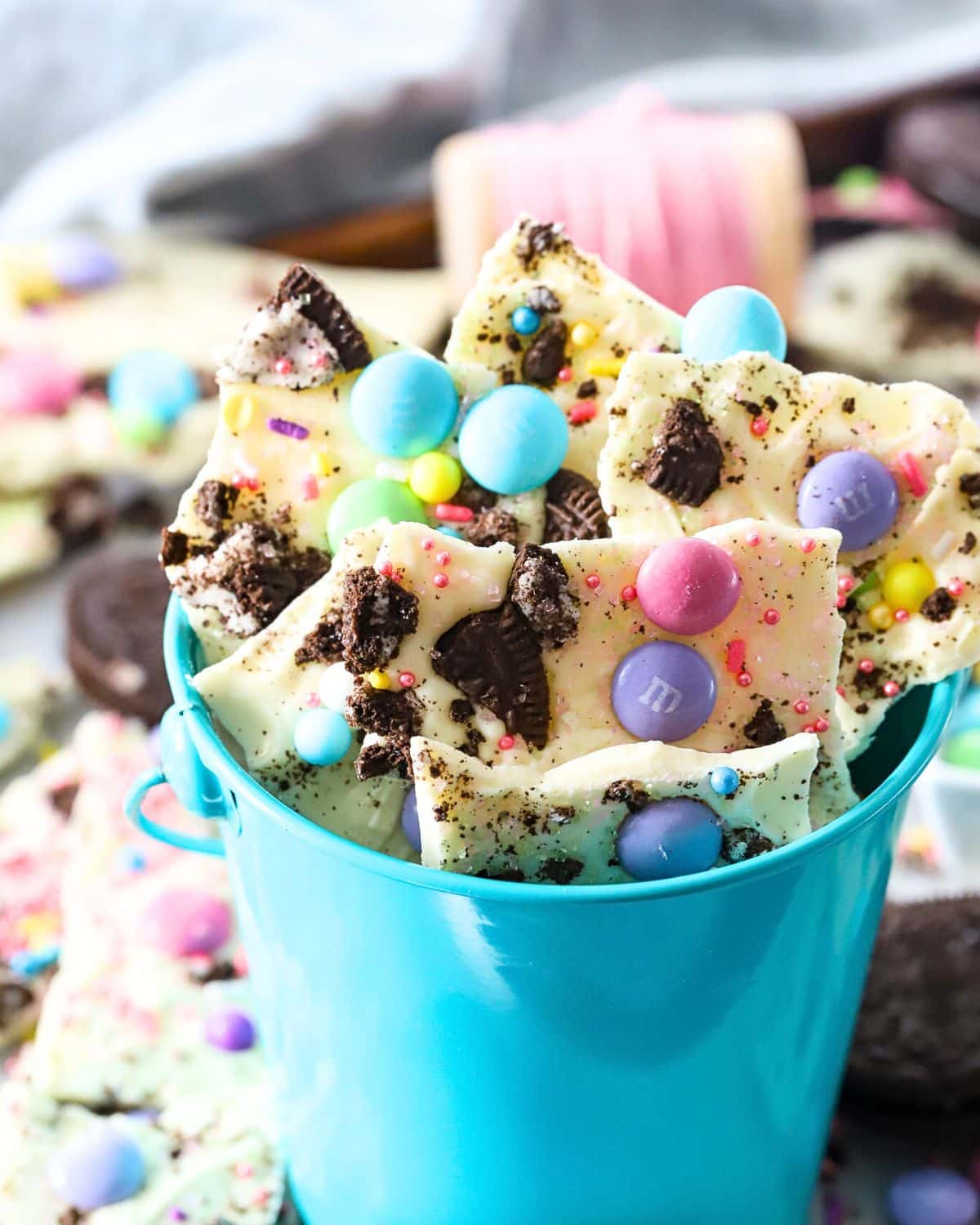 Easy to make Oreo Bark in a blue container.