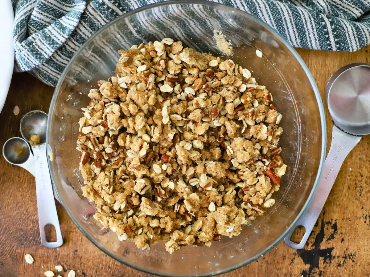 Oat topping in a bowl for peach crisp.