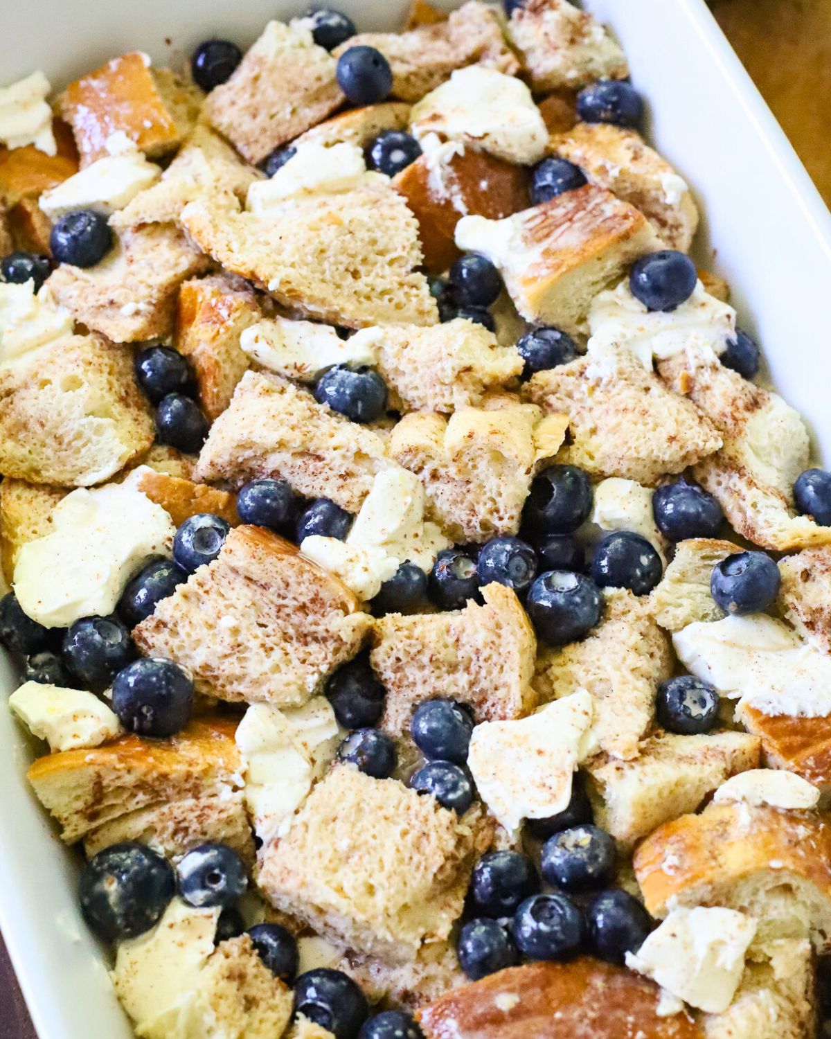 A breakfast casserole ready to go in the oven.