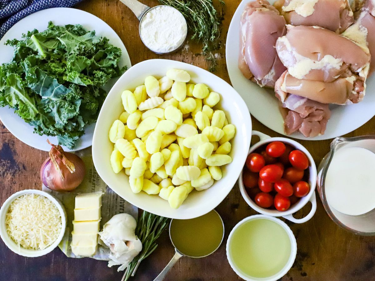 Ingredients to make creamy chicken gnocchi with kale.