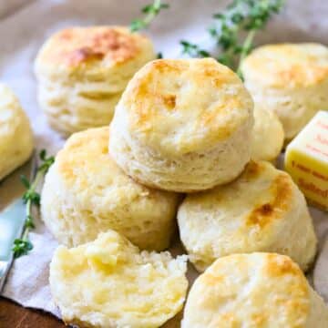 Stacked buttermilk biscuits.