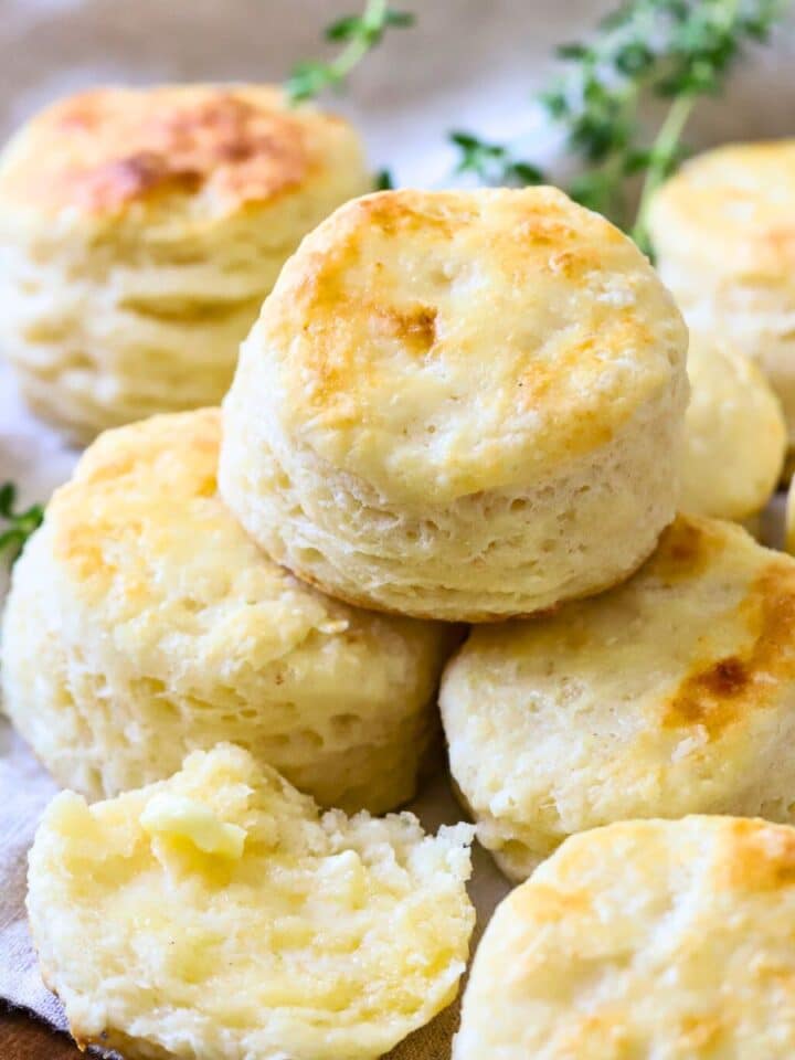 Stacked buttermilk biscuits.