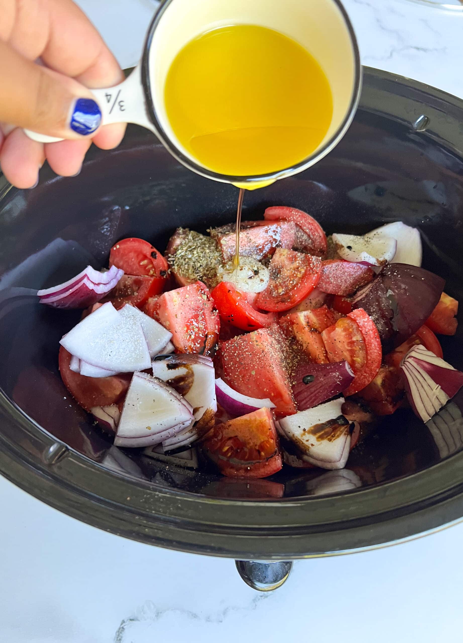 Tomato Basil soup ingredients in slow cooker