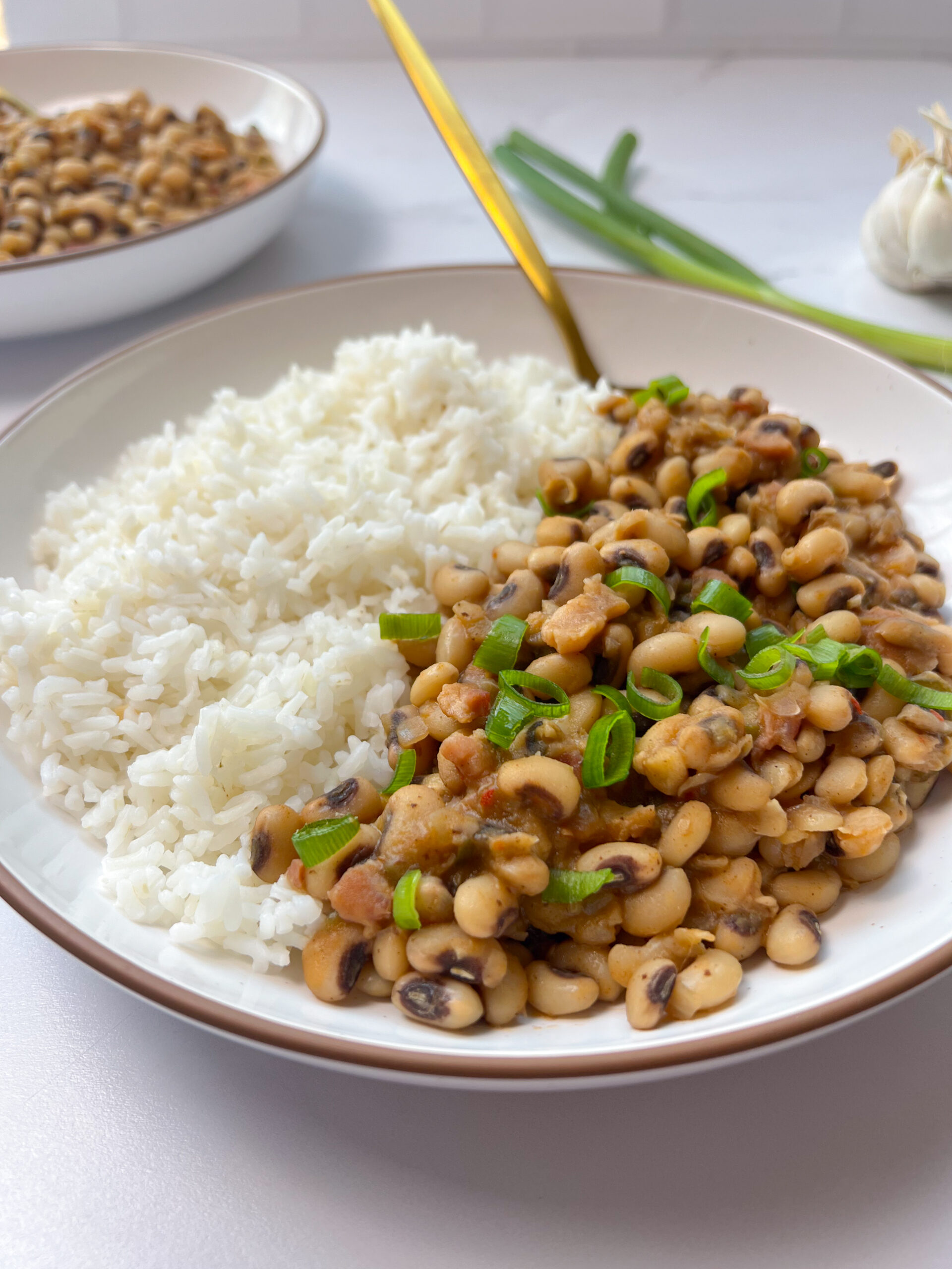 Spicy Black-Eyed Peas with Rice topped with green onions