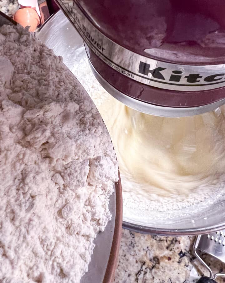 Dry ingredients being poured into wet ingredients