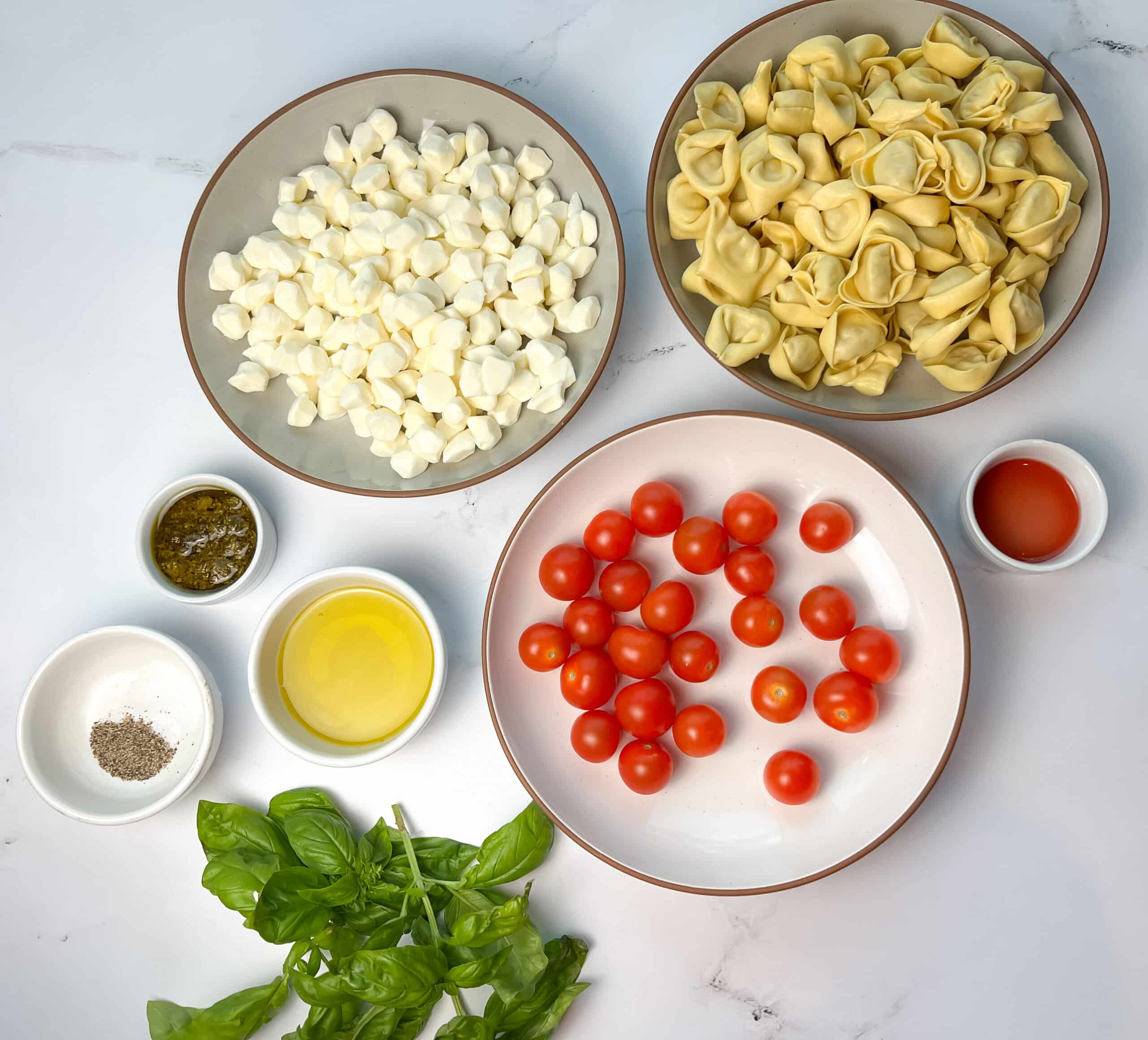 Ingredients for tortellini caprese skewers