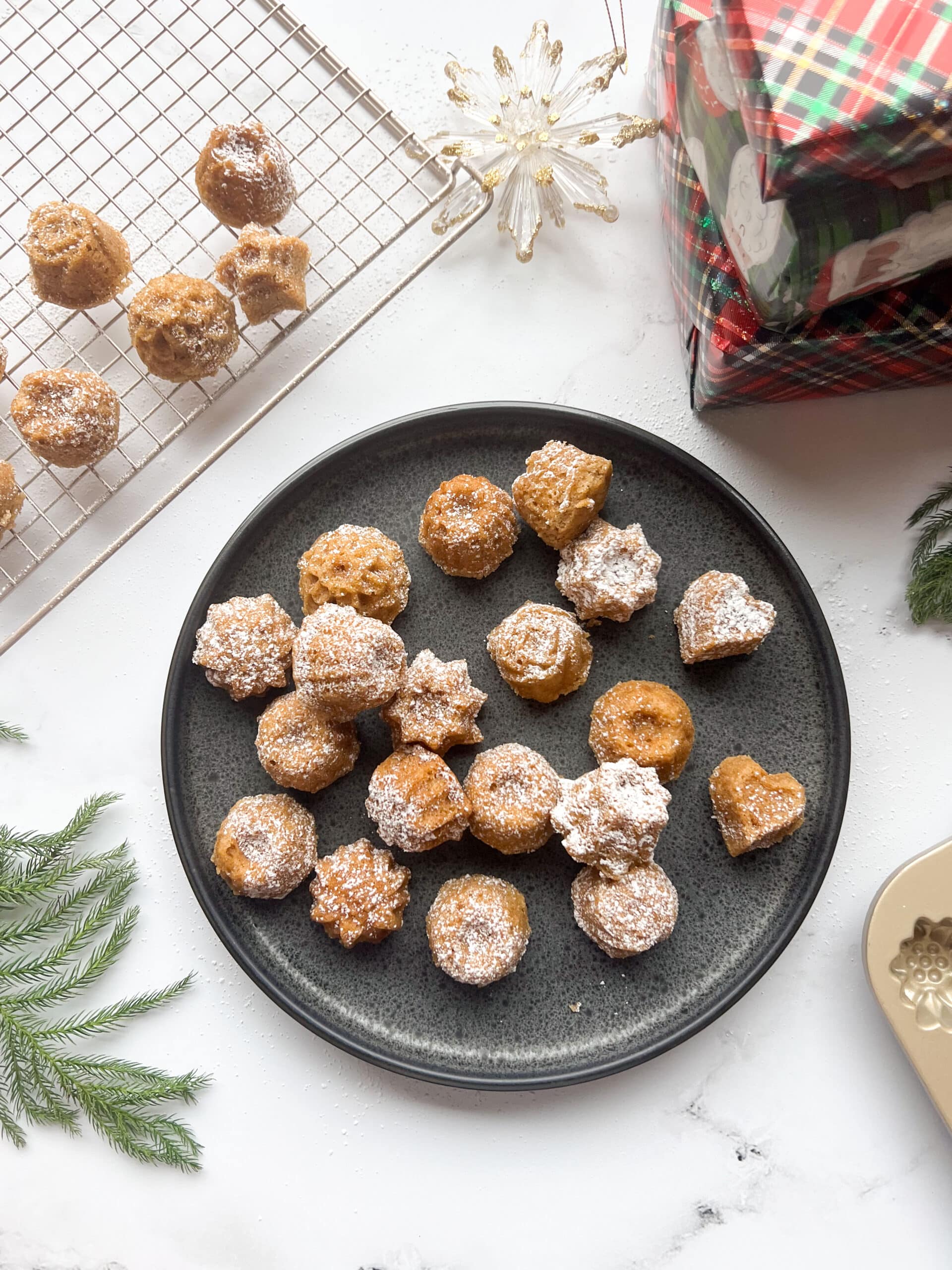 Cardamom tea cakes dusted with powdered sugar