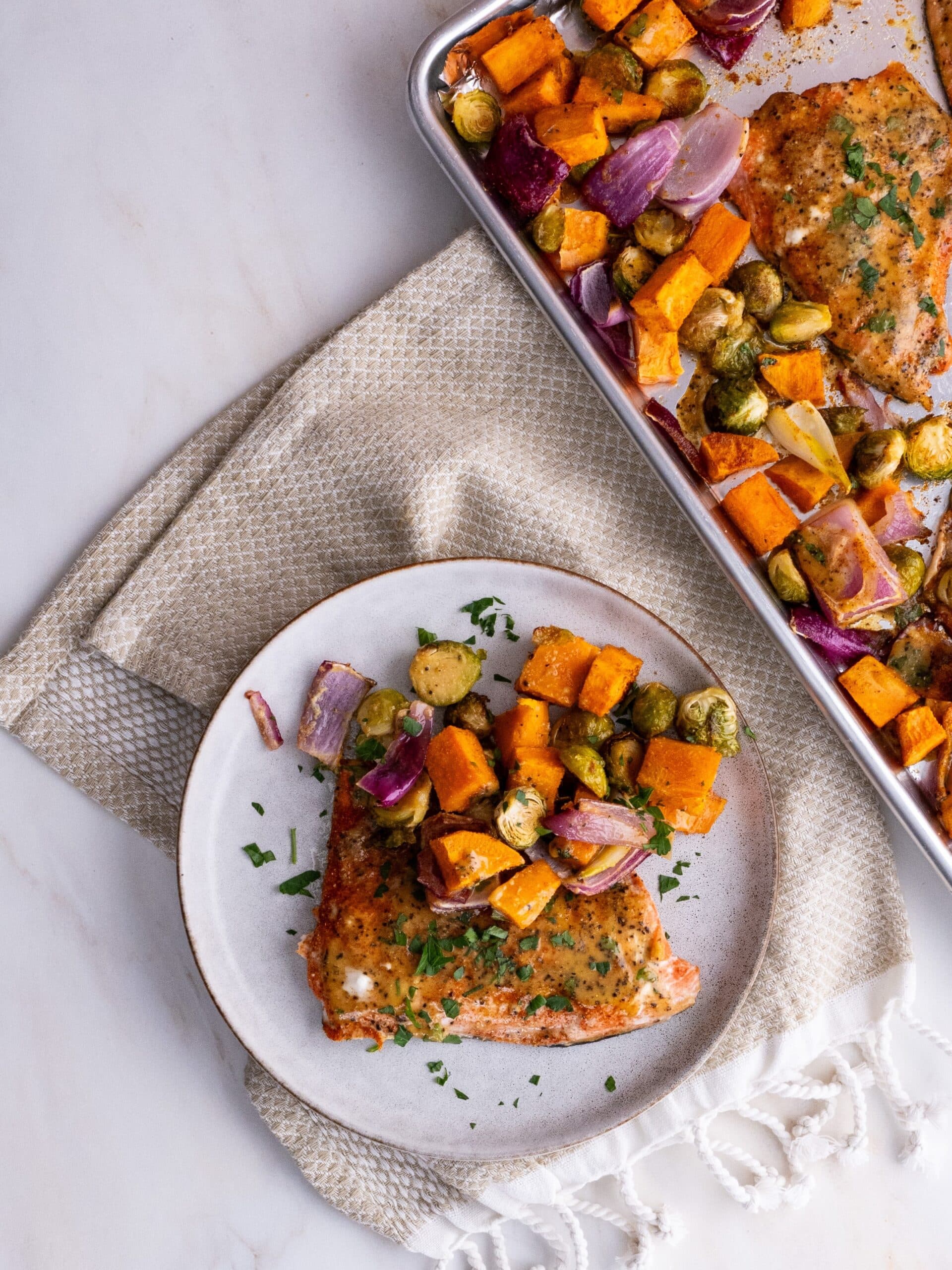 Sheet pan salmon plated with roasted vegetables