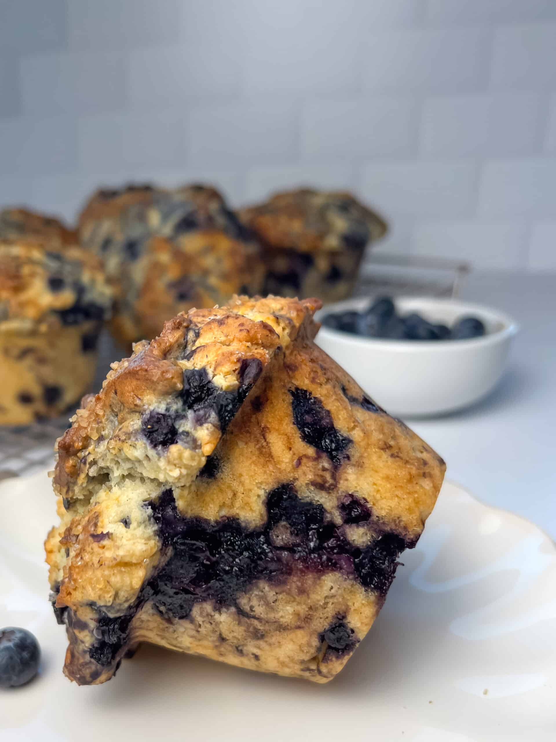 Close-up of buttermilk blueberry muffins after baking, on its side