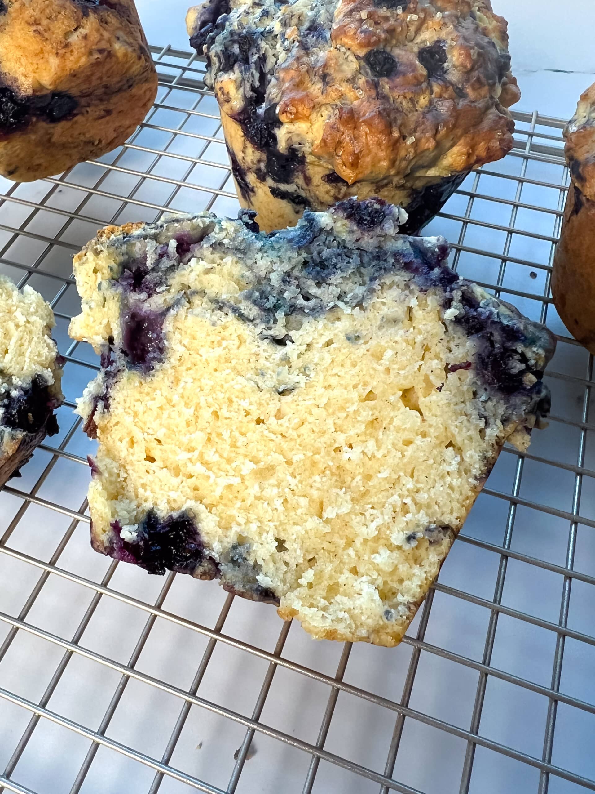 Buttermilk blueberry muffin sliced open