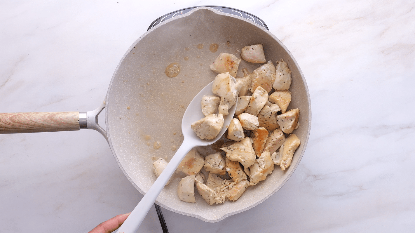 Cooking seasoned pieces of chicken