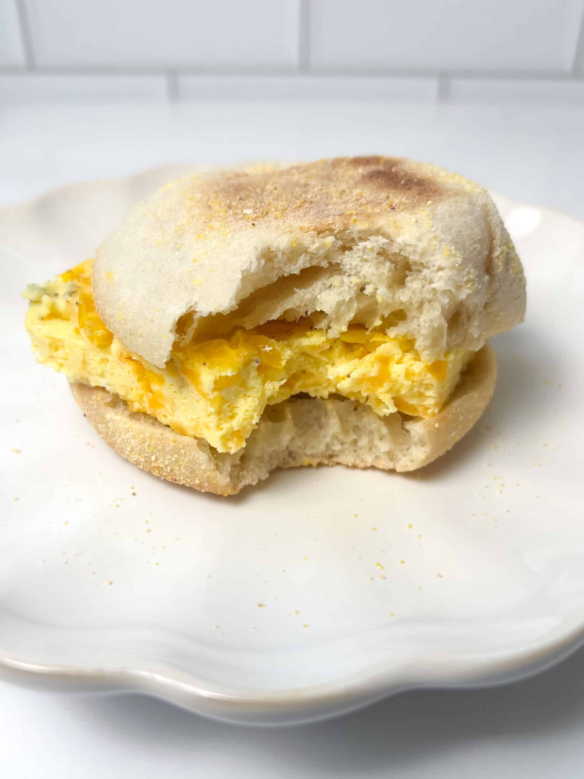 Breakfast sandwich with a bite taken out